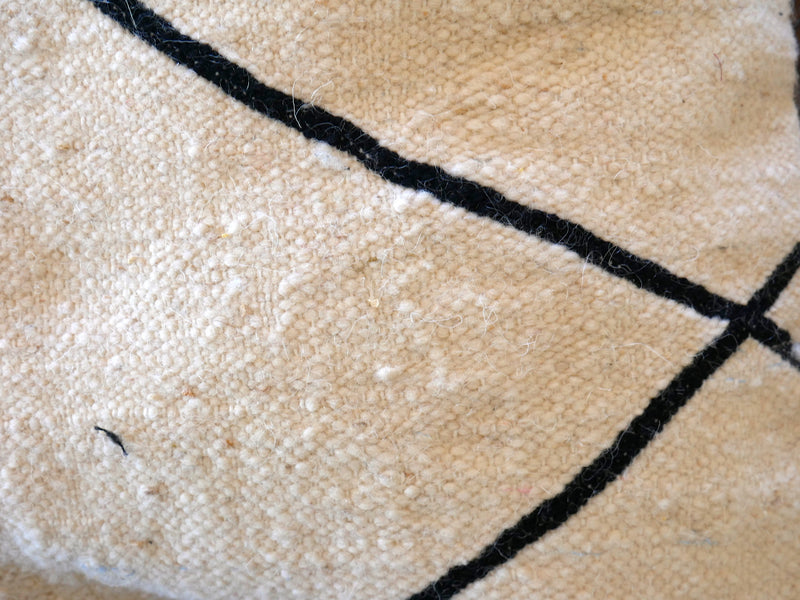 Cream with black cross detail cushion